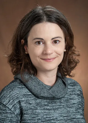 Sarah Signor looking confidently at camera.