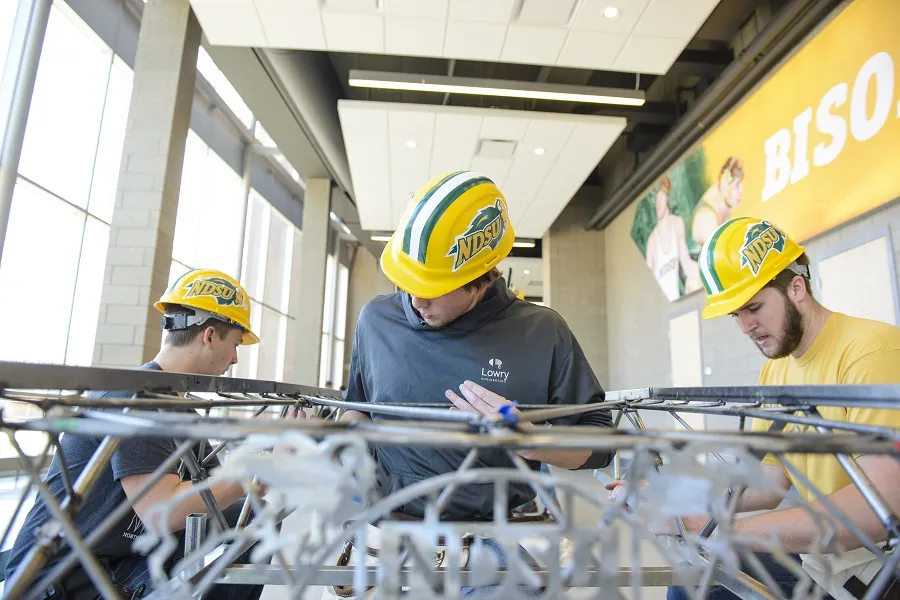 ASCE Steel Bridge students working on a project