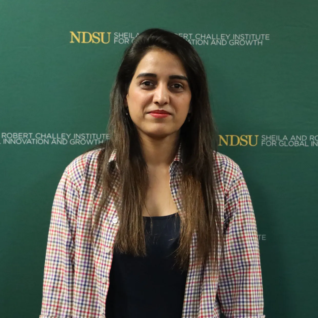 Headshot of Amna Riasat