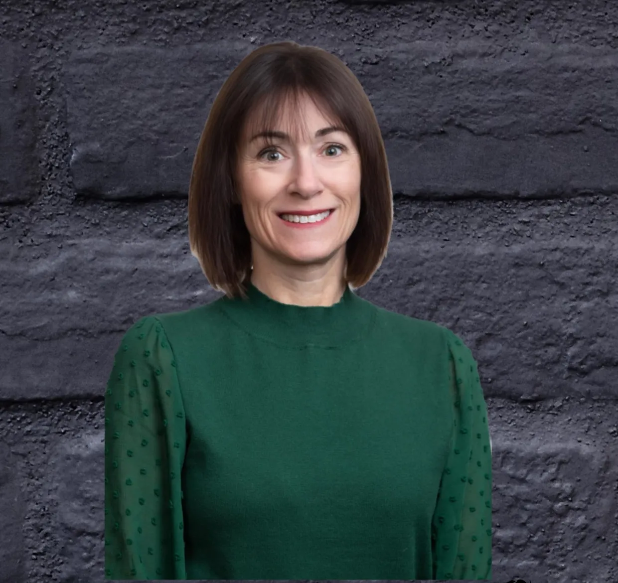 Dr. Kate Cook smiling confidently at camera.