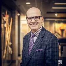 Jay Christian Krabbenhoft Jr. smiling confidently at camera.