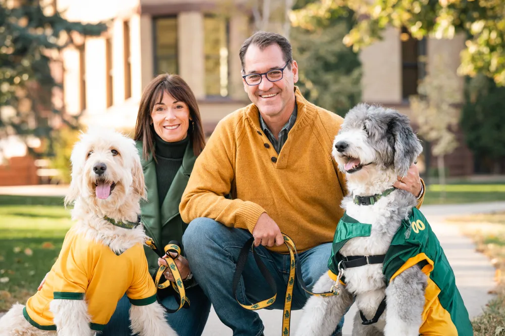 David and Kate Cook photographed with their 2 dogs