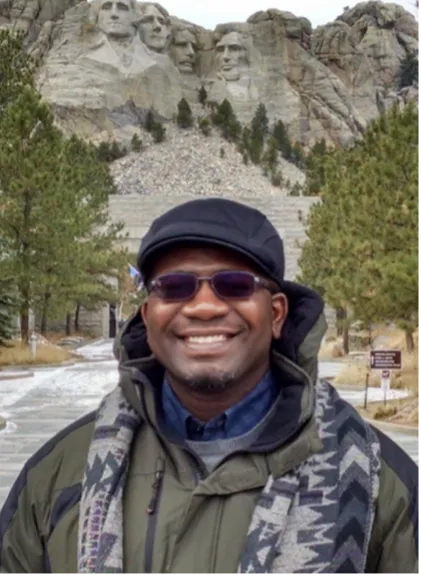 Mafany Ndiva Mongoh smiling confidently at camera.