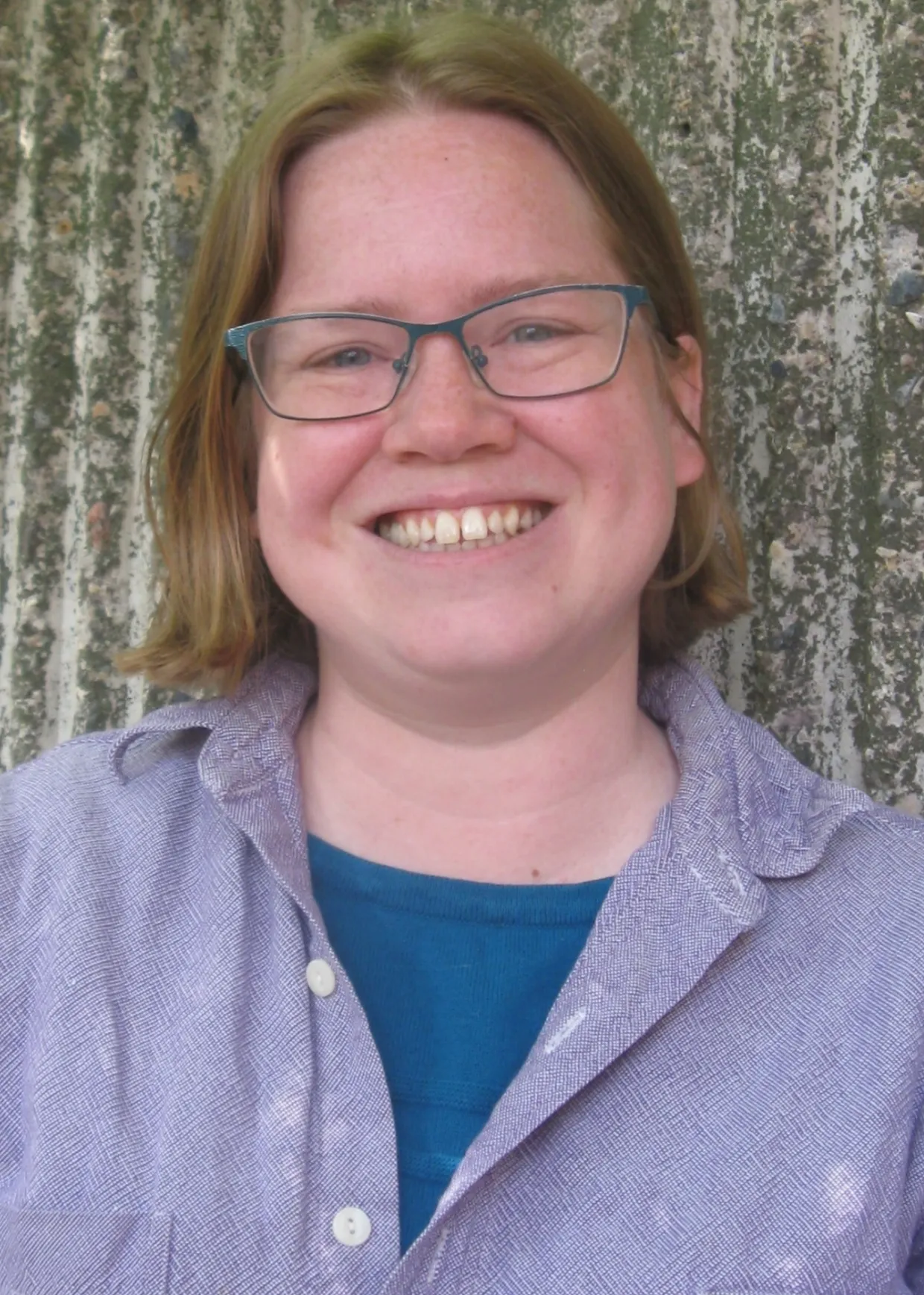 Grace Hirzel smiling confidently at camera.