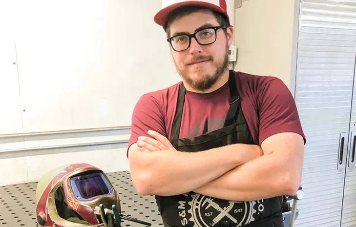 Dave Sauvageau looking confidently at camera.