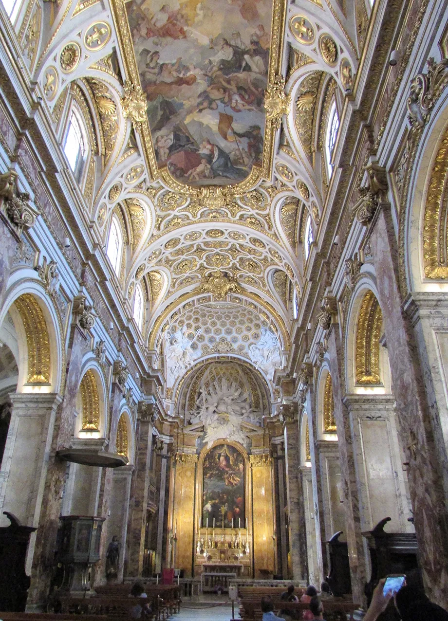 Ornate ceiling of church located in Italy.