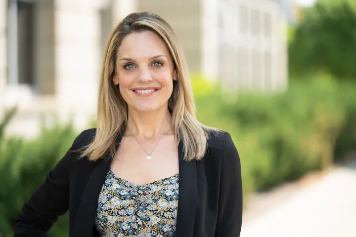 Elizabeth standing outside of Barry Hall