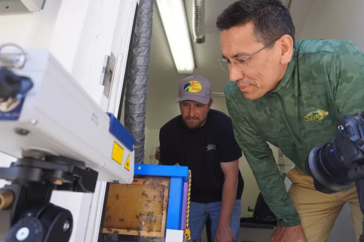 North Dakota State University assistant professor of agricultural and biosystems engineering, Sulaymon Eshkabilov, stands in his lab.