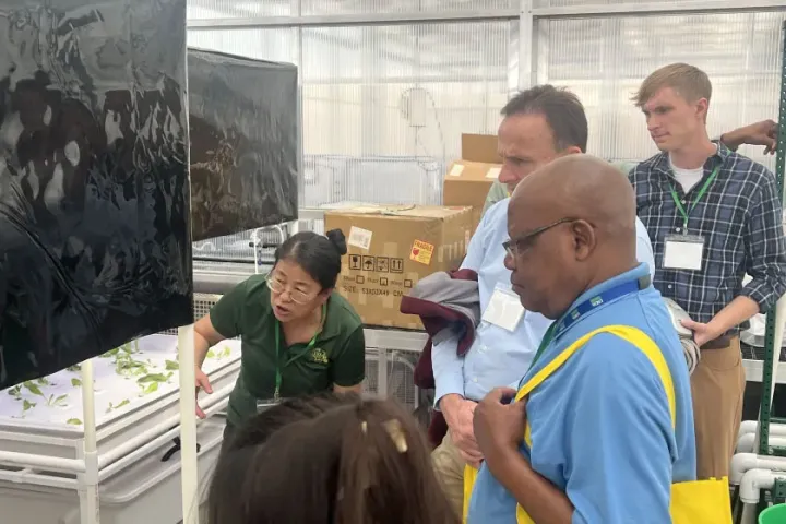 Xinhua Jia, NDSU professor of agricultural and biosystems engineering interacts with CEA attendees