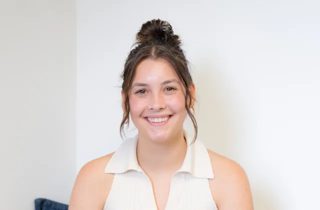 Abby Zimmerman sitting on couch