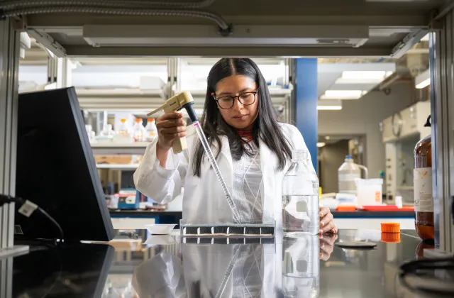 Marisol working in lab