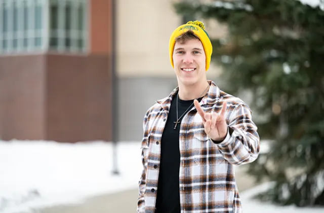 Chance Bollinger poses on the NDSU campus in the winter