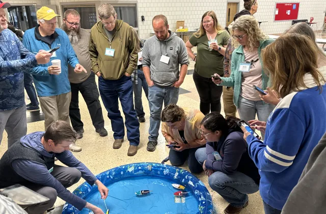 feeding and fueling the world class conducting an experiment