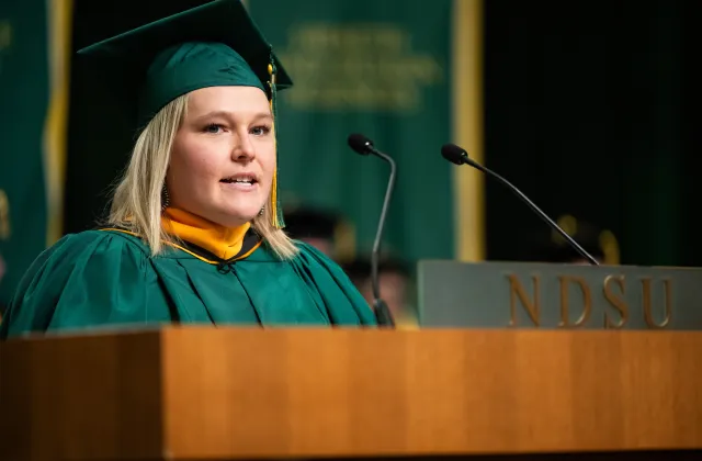 Josi Solsaa speaking at commencement