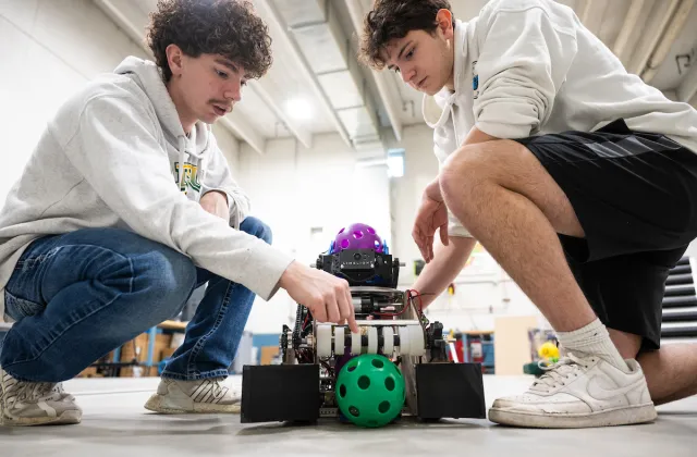 students work together in Robotics & Automation class