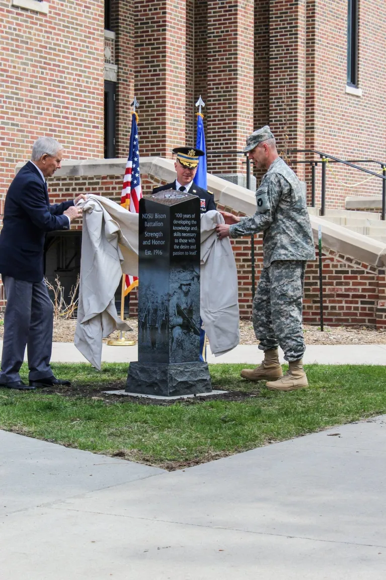 Unveiling of 100-year Monumnet in front of Bentson Bunker Fieldhouse.