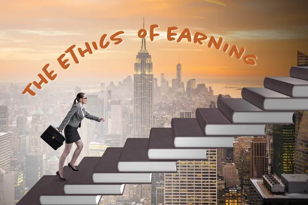 A girl walking up a set of book stairs