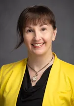 Aletha Lippay smiling confidently at the camera