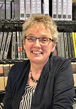 Susan Ray-Degges smiling confidently at camera