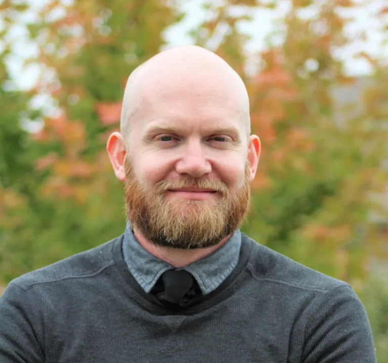 Headshot of Clay Routledge