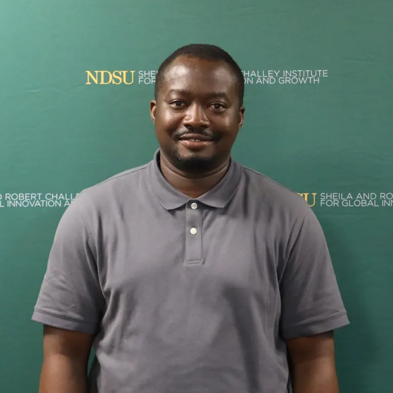 Headshot of Bismark Asante