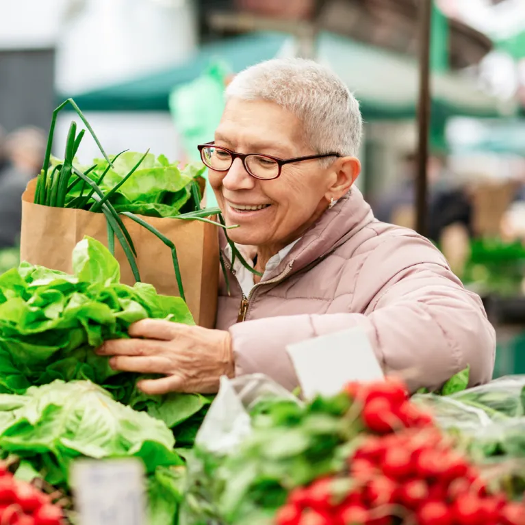 Image of person in produce section