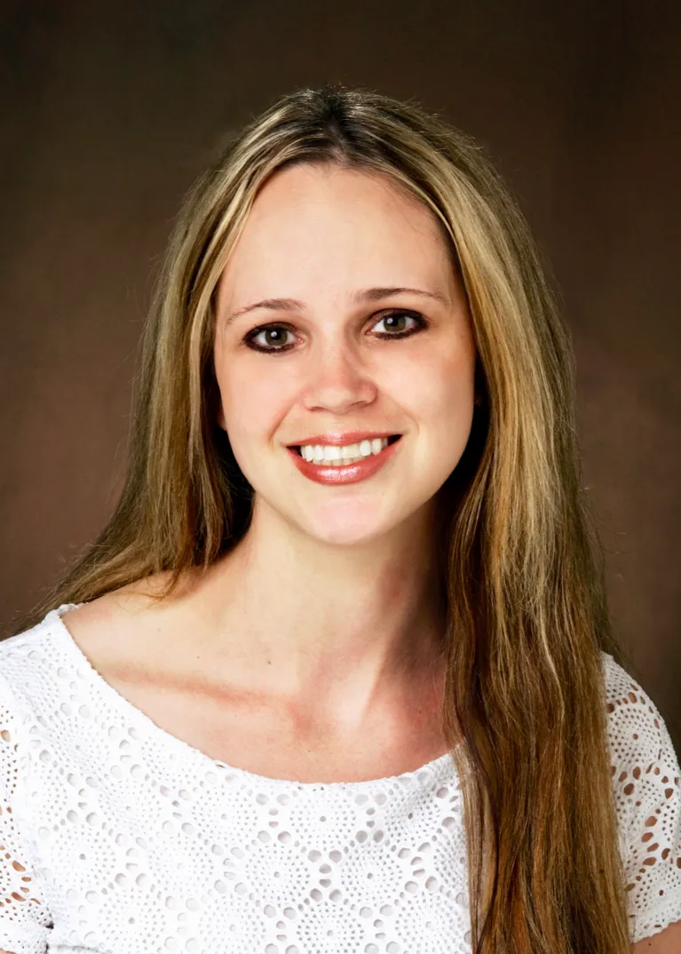 Baggett smiling confidently at camera