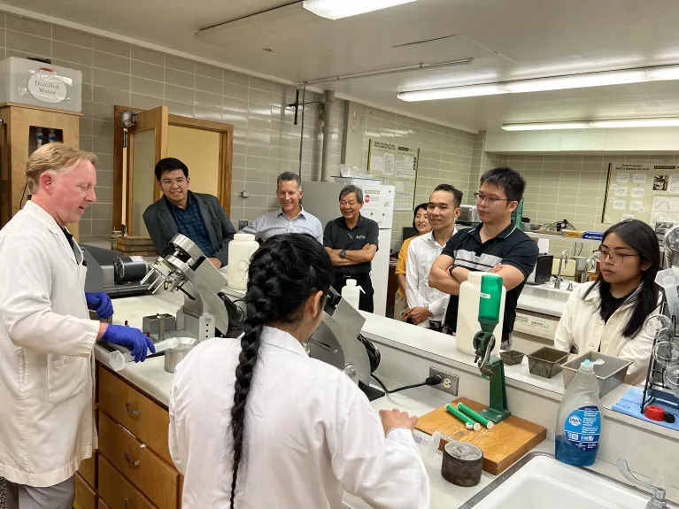 Baking demonstration for a group visiting the labs