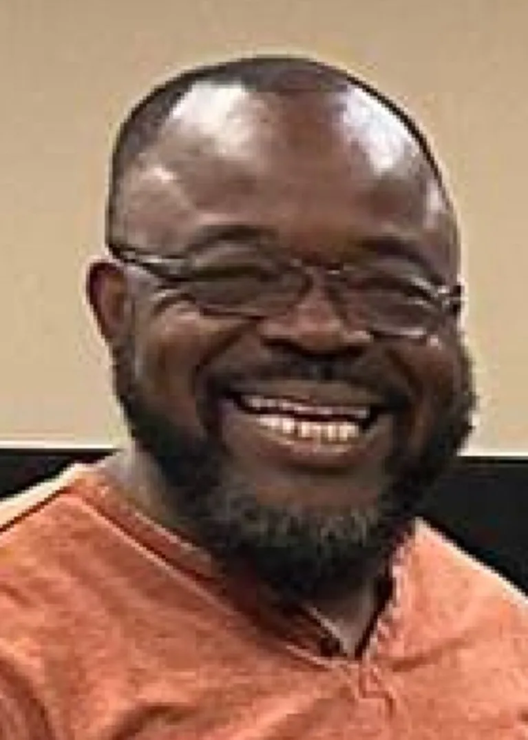 Emmanuel Nojang smiling at the camera