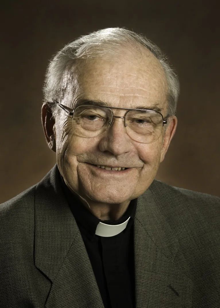 William smiling at the camera