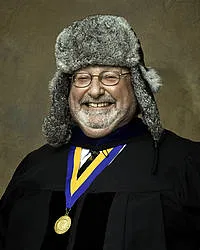 Tom smiling at the camera