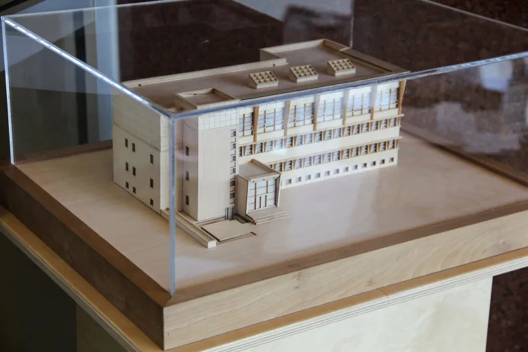Wooden model of Klai Hall protected by glass cover.