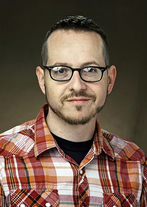 Anthony Faris smiling at the camera