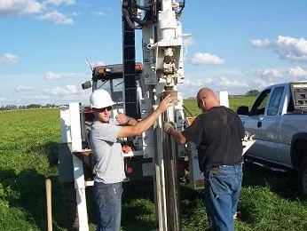 Chase Christenson working in the field