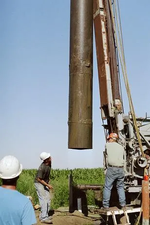 Chase Christenson working in the field