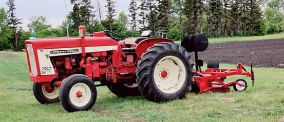 Figure: Tractor mounted mulch and drip tape laying machine.